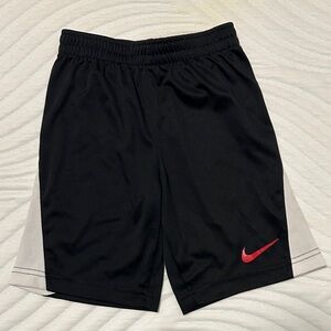 Nike Men's Black Shorts with Red Swoosh